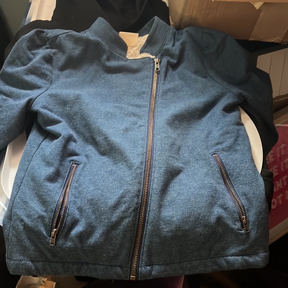 Adorable zip up 7-8 girls sweater. Zips all way blue and fur inside for warmth - Picture 2 of 3